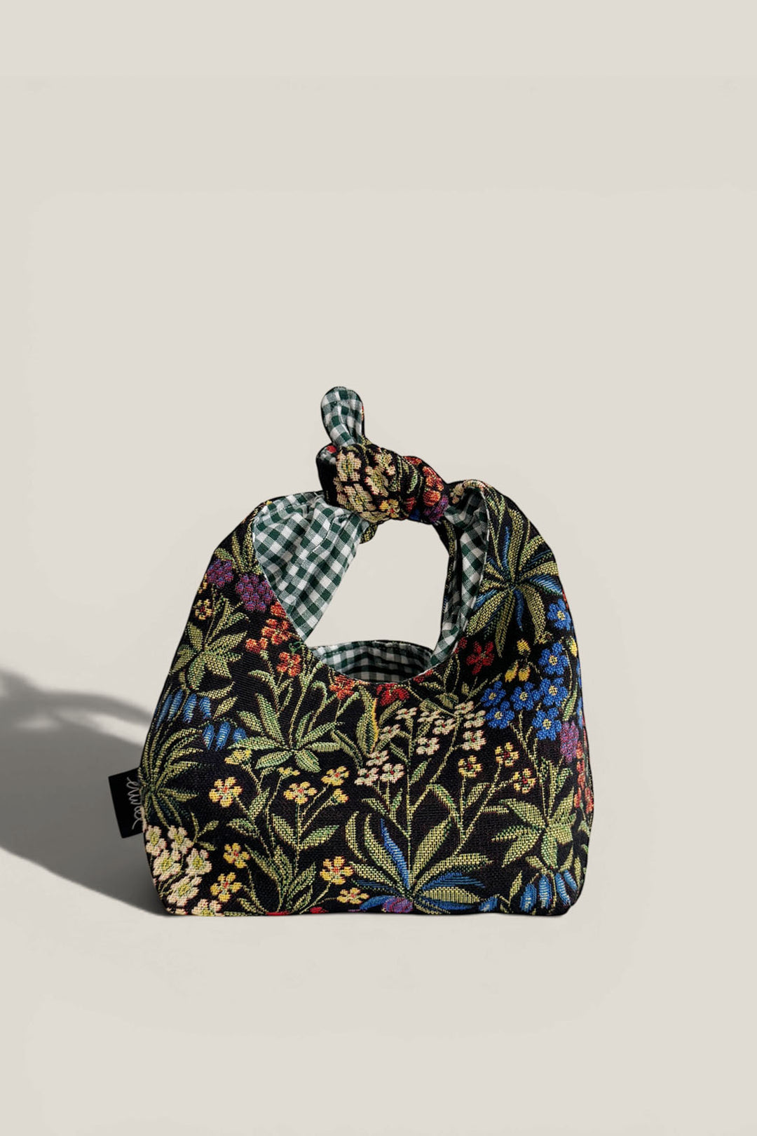 Bolso mano anudado tejido jacquard margaritas