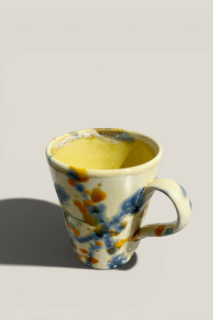 Taza salpicado azul
