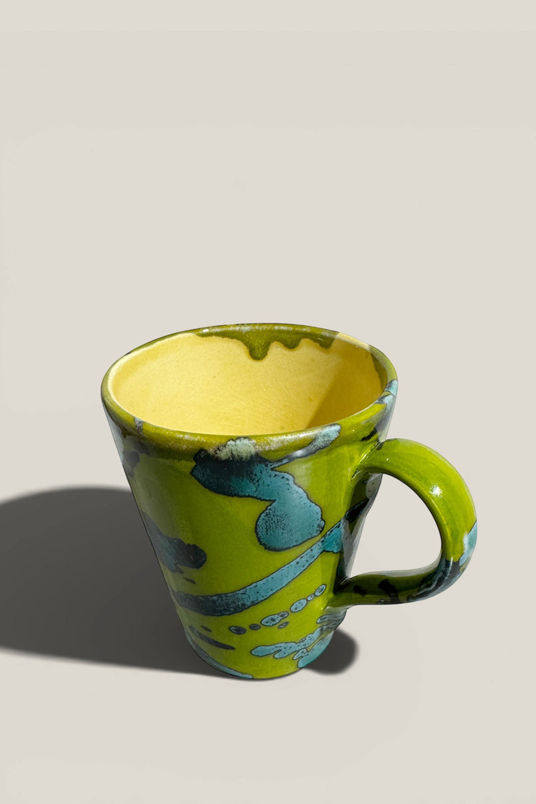 Taza salpicado olivo